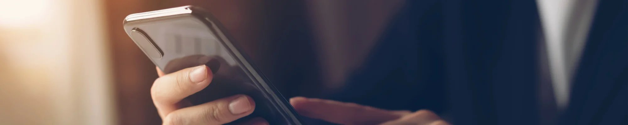 person making a phone call in Colorado Springs, CO at IQ Floors | 3350 Fillmore Ridge Heights, Colorado Springs, CO 80907