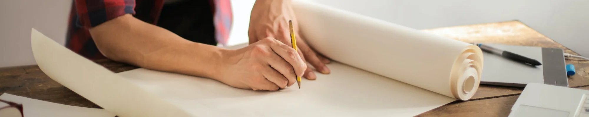 skilled professional drawing home renovation plans in Colorado Springs, CO at IQ Floors